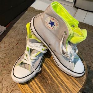 Converse Chuck Taylor high tops.